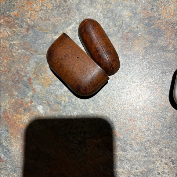 Apple air pods. Name and phone are engraved on them work great - Picture 6 of 7